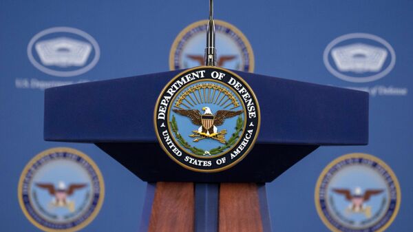 The Department of Defense Seal is seen on the podium before Pentagon spokesman U.S. Air Force Brig. Gen. Patrick Ryder speaks during a media briefing at the Pentagon, Friday, Feb. 24, 2023, in Washington. - Sputnik Africa