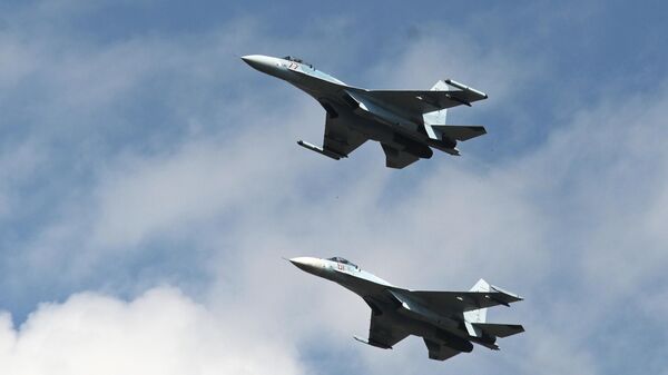 Sukhoi Su-27 jet fighters fly - Sputnik Africa