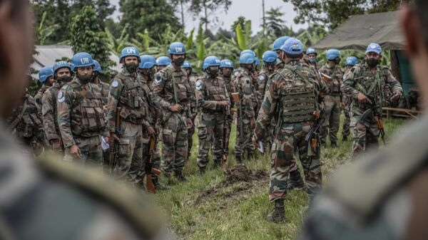 MONUSCO blue helmet deployed near Kibumba, north of Goma, Democratic Republic of Congo, Friday Jan. 28, 2022. Thousands of people in the Democratic Republic of Congo have been displaced after they fled ongoing clashes between the Congolese army and M23 fighters this week.  - Sputnik Africa