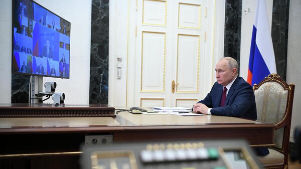 Russian President Vladimir Putin holds a meeting with members of the Russian government via videoconference on July 4, 2023.  - Sputnik Africa