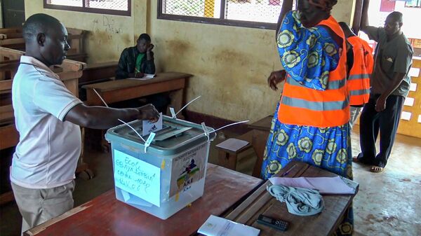 In this image taken from video, a man casts his vote in Bangui, Central African Republic, Sunday July 30, 2023. The Central African Republic went to the polls on Sunday in a highly anticipated vote on a new constitution, which would remove presidential term limits. - Sputnik Africa