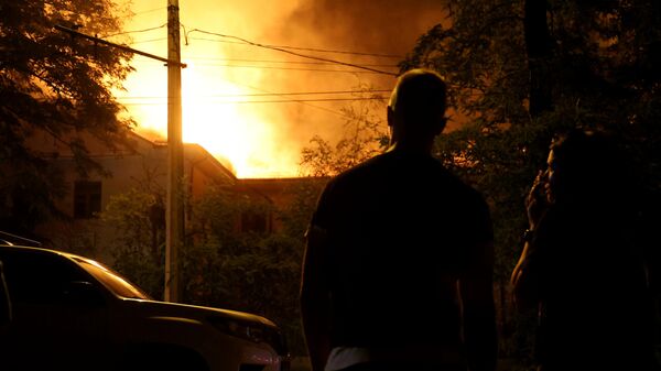 A fire rages in the building of the Donetsk National University of Economics and Trade as a result of shelling by cluster shells in the course of Russia's military operation in Ukraine, in Donetsk, Donetsk People's Republic, Russia, on August 5, 2023. - Sputnik Africa