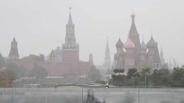 View of the Spasskaya Tower of the Moscow Kremlin and the Intercession Cathedral (St. Basil's Cathedral). - Sputnik Africa