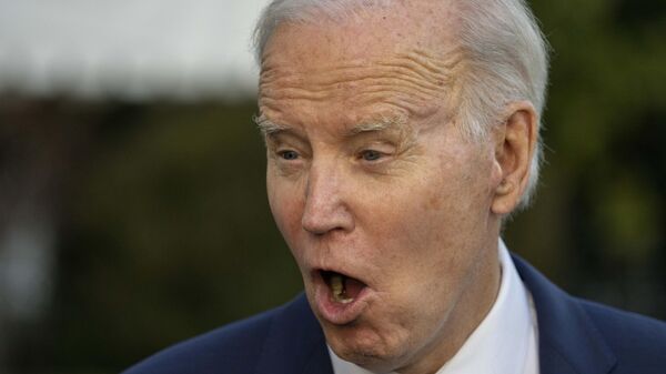 President Joe Biden speaks with reporters as he walks to Marine One upon departure on the South Lawn of the White House, Wednesday, March 1, 2023, in Washington.  - Sputnik Africa