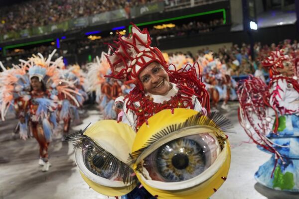 Performers from the Vila Isabel samba school parade during Carnival celebrations at the Sambadrome in Rio de Janeiro, Brazil, early Tuesday, Feb. 13, 2024. - Sputnik Africa
