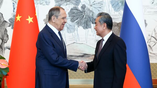 Russian Foreign Minister Sergey Lavrov and his Chinese counterpart Wang Yi during their meeting in Beijing on April 9, 2024. - Sputnik Africa