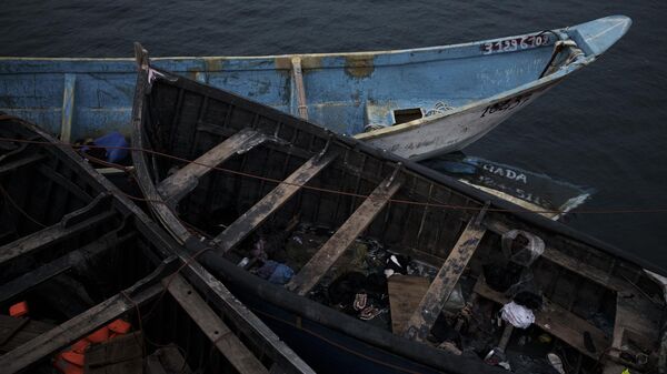 Empty boats used by migrants are moored at the port of Arguineguin in the Canary island of Gran Canaria, Spain - Sputnik Africa