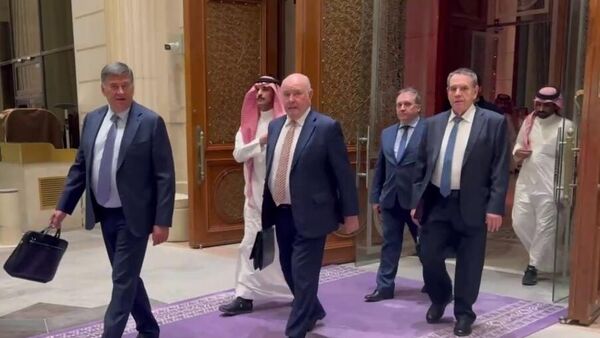 Head of the International Committee of the Federation Council Grigory Karasin, center, and FSB Director Advisor Sergei Beseda, left, after the end of talks between the Russian and US delegations on settling the Ukrainian conflict in Riyadh. - Sputnik Africa