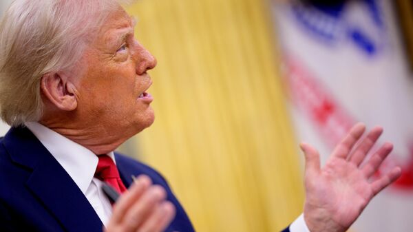 US President Donald Trump speaks during an executive order signing event in the Oval Office of the White House on March 31, 2025 in Washington, DC.  - Sputnik Africa