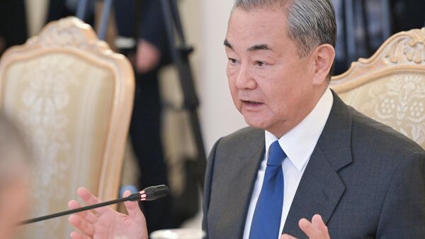 Chinese Foreign Minister Wang Yi during a meeting with Russian Foreign Minister Sergey Lavrov in Moscow. April 1, 2025. - Sputnik Africa