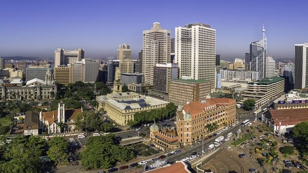 Durban city seen with its skyscrapers and the harbor in the distance, St Pauls Anglican church, the City Hall, Central Post Office and durban station in the old Edwardian and Victorian architecture. - Sputnik Africa