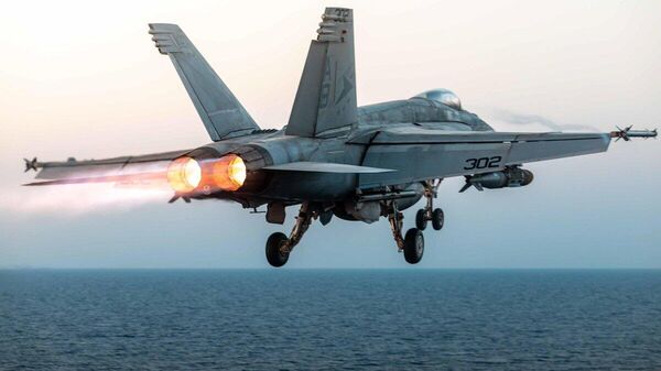 US aircraft assigned to Carrier Air Wing ONE, CVW-1 launch from the flight deck of the Nimitz-class aircraft carrier USS Harry S. Truman (CVN 75) during flight operations in the US Central Command area of responsibility. March 2025. - Sputnik Africa
