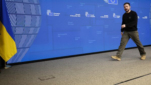 Ukraine's Volodymyr Zelensky leaves the podium after addressing a media conference during an EU summit in Brussels, Thursday, Dec. 19, 2024 - Sputnik Africa