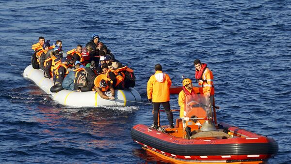 Des migrants - Sputnik Afrique
