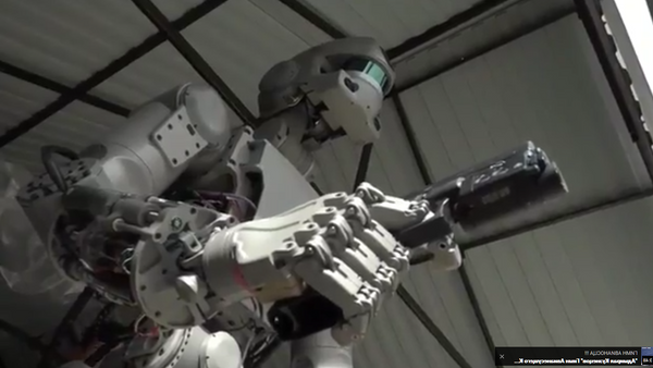 un robot - Sputnik Afrique