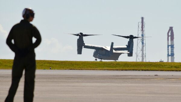Un avion de transport arrive à la base de  Futenma dans la préfecture d'Okinawa - Sputnik Afrique
