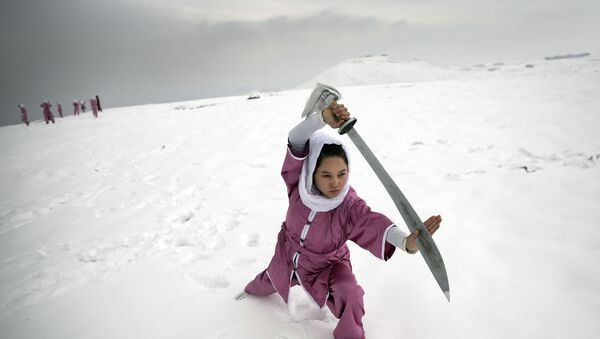 entraînement d'une étudiante Shaolin - Sputnik Afrique