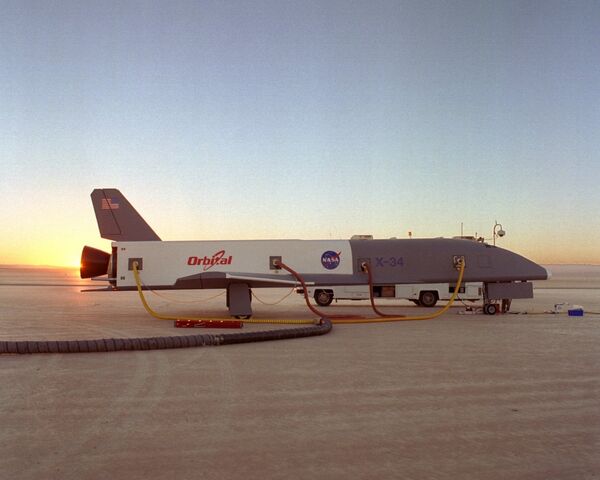 X-34 sur le lac asséché de la Base Edwards X-34 sur le lac asséché de la Base Edwards - Sputnik Afrique