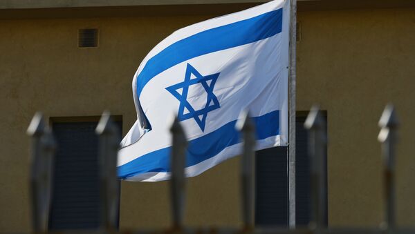 The flag on the premises of the Embassy of Israel in Moscow which has suspended its operations as the diplomats go on strike. - Sputnik Afrique