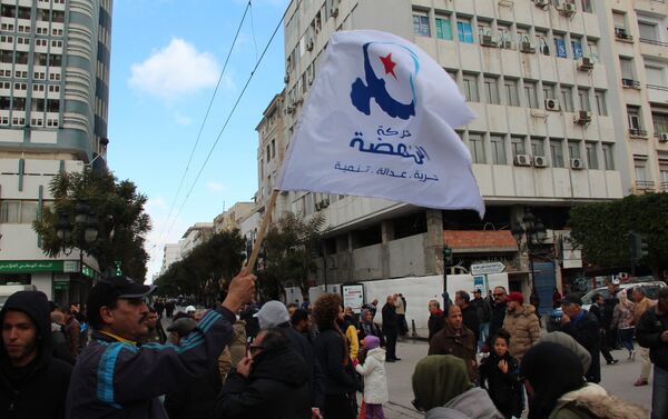 Les Tunisiens célèbrent les 8 ans de la Révolution Les Tunisiens célèbrent les 8 ans de la Révolution - Sputnik Afrique