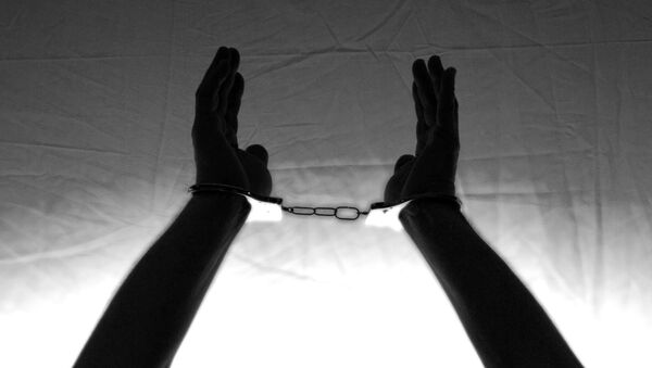 Una persona esposada (imagen referencial) - Sputnik Afrique