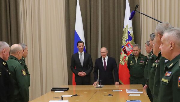 Une rencontre de Vladimir Poutine et Bachar el-Assad (archive photo) - Sputnik Afrique